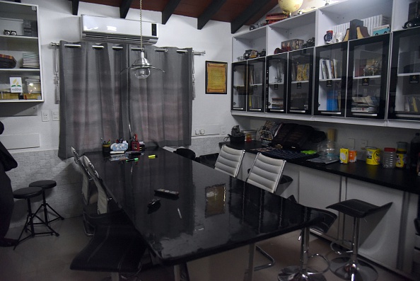 View of Brazilian drug trafficker Jarvis Chimenes Pavao's cell at Tacumbu prison in Asuncion on July 28, 2016. Three rooms, a plasma TV, a library, and even a collection of DVDs of Colombian Pablo Escobar TV series, Jarvis Pavao Chimenes lived in a luxury cell in Tacumbu prison, one of the most crowded of Paraguay. / AFP / NORBERTO DUARTE / TO GO WITH AFP STORY (Photo credit should read NORBERTO DUARTE/AFP/Getty Images)
