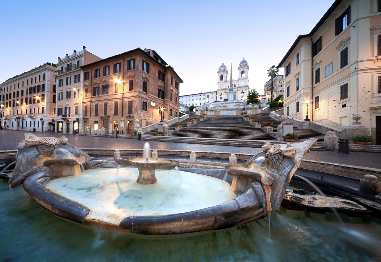 The Spanish Steps in Rome. In the foreground is the fountain called Fontana della Barcaccia Fountain of the Old Boat